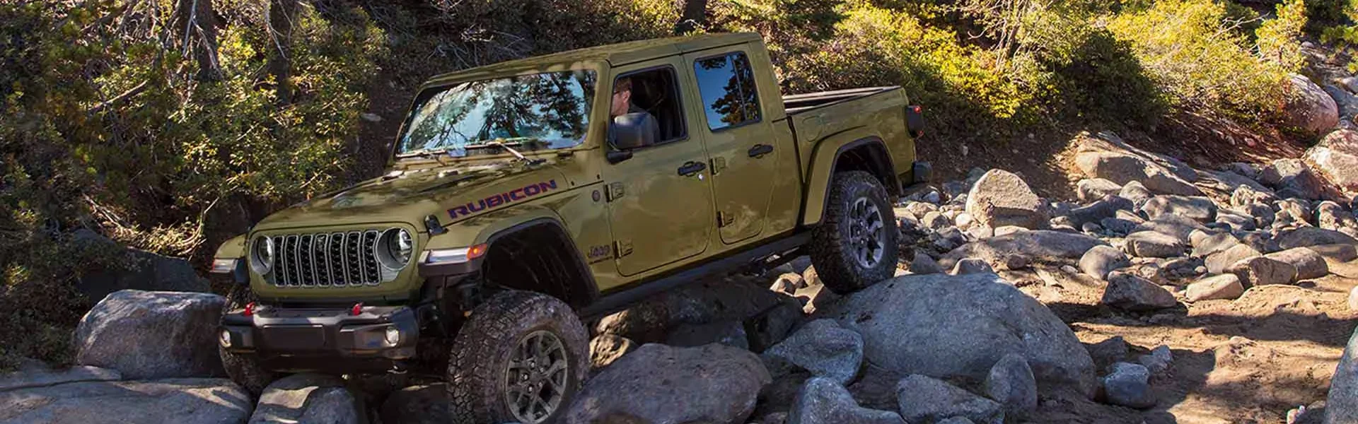 Rock crawling Jeep on big tires
