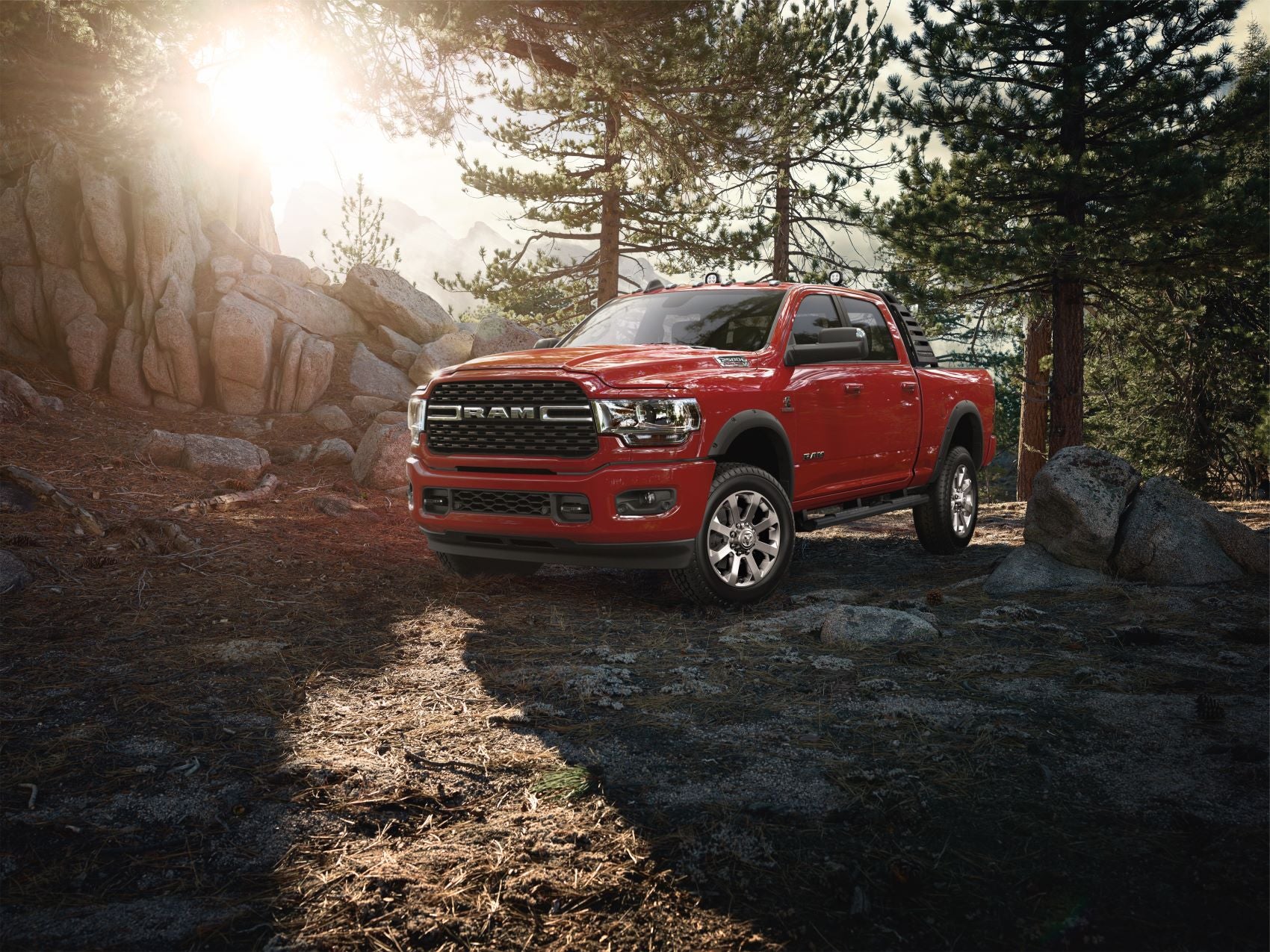 Red Ram Truck parked in forest