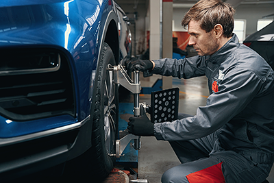 Precision computerized wheel alignment measuring vehicle suspension angles